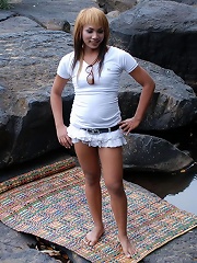 Pretty Ladyboy posing on outdoor place